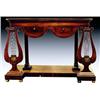 Image 1 : A French Louis Philippe walnut and brass mounted console table, circa 1830, the rectangular strun...