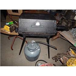 BBQ AND PROPANE TANK - TANK HAS A BIT OF PROPANE IN IT