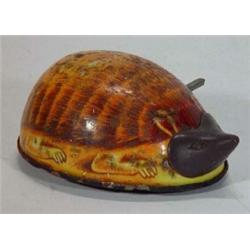 Chinese tinplate clockwork hedgehog, 8cm in length…