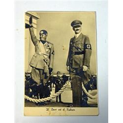 World War II postcard showing Mussolini with Hitler…