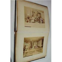 Large leather bound book including selection of hand coloured, oriental photographs…