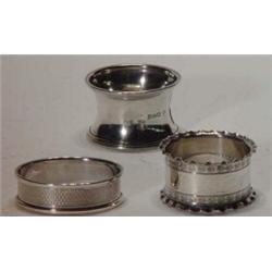 Three silver napkin rings…