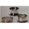 Image 1 : Three silver napkin rings…