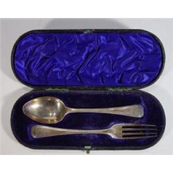 Cased silver dessert spoon and fork…