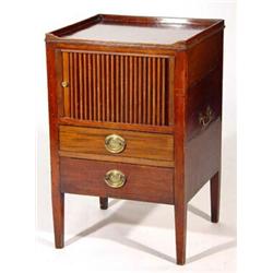 19th century mahogany commode, the galleried top above a tambour front and two ebony strung drawe…