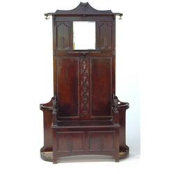 Carved mahogany hallstand with box seat and carved lion supports…