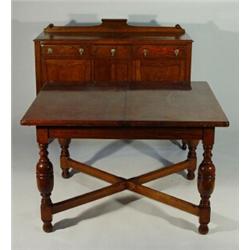 Oak extending dining table on bulbous turned legs with a cross stretcher and a matching sideboard…