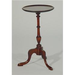 Mahogany wine table, the circular dish shaped top on turned column tripod base…