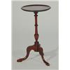 Image 1 : Mahogany wine table, the circular dish shaped top on turned column tripod base…