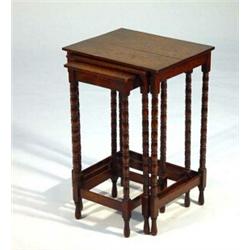 Nest of three oak tables on bobbin turned supports…