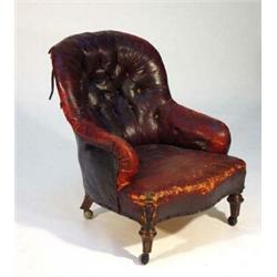 Victorian leather buttonback armchair on turned mahogany feet…