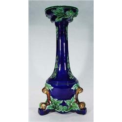 Majolica plant stand decorated with green leaves on a blue ground, 70cm high…