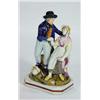 Image 1 : Early hand painted Staffordshire figure group of a gentleman and seated lady, 25cm high…