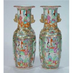 Large pair of Chinese Famille Rose vases with gilded handles, hand painted with figures amongst f…