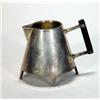 Image 1 : Silver plated Christopher Dresser designed triangular four footed cream jug with ebony handle, 8c…