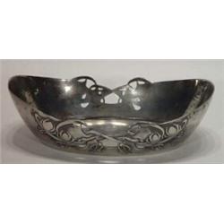 Liberty's Art Nouveau pewter oval dish, decorated with stylised flowers, marks to base, 25cm in l…