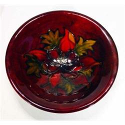 Moorcroft 'Frilled Orchid' patterned red glazed shallow bowl, 25cm diameter, various marks to bac…