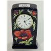 Image 1 : Moorcroft floral patterned clock onto a blue background, impressed Moorcroft and W.M. mark to bas…