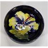 Image 1 : Small Moorcroft dish, decorated with a yellow frilled orchid, various marks to base, 8cm diameter…