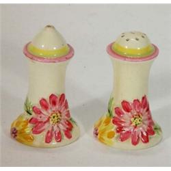 Hand painted Clarice Cliff Bizarre salt and pepper, relief moulded with colourful flowers, 8cm hi…