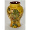 Image 1 : Brannam Barnstable yellow glazed vase, decorated with a blue and brown parrot amongst foliage, im…