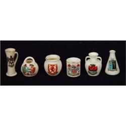 Six Goss crested china vases…