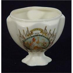 Transfer printed and hand painted British Empire Exhibition crested urn, 10cm high…