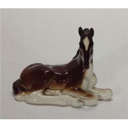 Hand painted USSR seated foal, marks to base, 11cm high…