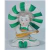 Image 1 : Hand painted Goebels seated girl playing a mandolin wearing a green striped hat, impressed marks…