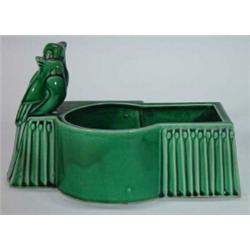 Green glazed Bourne Denby planter with seated parrot decoration, 32cm in length, marks to base…