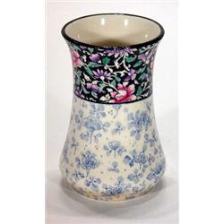 Royal Doulton vase, hand coloured and transfer printed with a blue and white floral pattern and a…