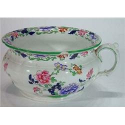 Hand coloured and transfer printed Copeland Spode chamberpot decorated with flowers, marks to bas…