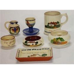 Selection of seven pieces of mottoware including tankard, eggcup, tray, etc…