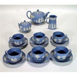 Wedgwood blue Jasperware teaset, comprising teapot, cream jug and milk jug, sugar bowl and cover,…