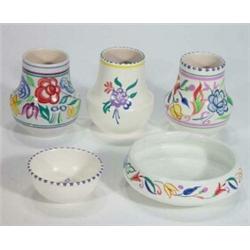 Three hand painted Poole pottery floral vases and two dishes…