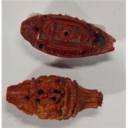 Two well detailed oriental carved nuts…