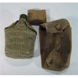 World War II military water bottle, field dressing and bag…