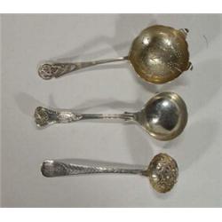 Victorian silver sifter, silver cream ladle and a strainer…