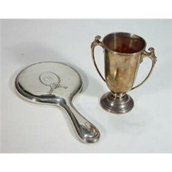 Twin handled silver trophy and a silver wooden backed hand mirror…