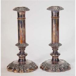 Pair of shaped silver plated candlesticks decorated with leaves and berries, 22cm high…