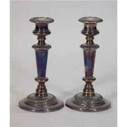 Pair of circular based silver plated candlesticks, 20cm high…