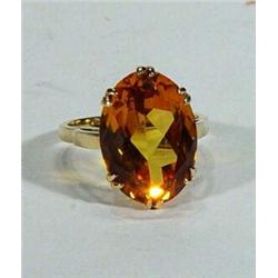 9ct gold ring set with a 15ct yellow sapphire…