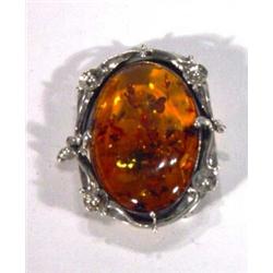 Amber and floral silver mounted brooch…