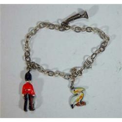 Painted soldier, trumpet and enamelled pelican bracelet…