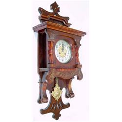 Art Nouveau mahogany cased chiming wall clock with visible pendulum, 95cm high…