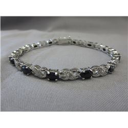 Oval cut Blue Sapphire & Diamond tennis bracelet