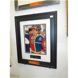 Framed photograph of Ted Musgrave