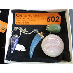4 Polished stone pendants - Agates & Quartz