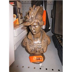 Cast metal bust of a woman in a feathered hat