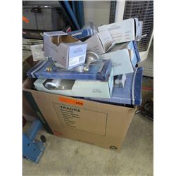Large box of new bathroom accessories